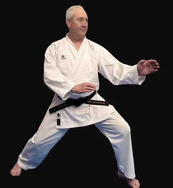 Sensei Liviu Nicolaie, instructor at Tomyris Karatedo, in a karate stance